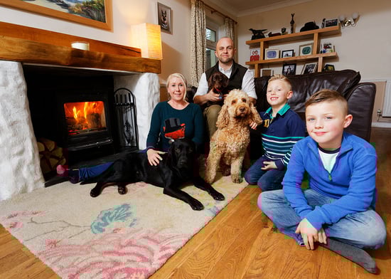 Millin Brook owners, family, and dogs at home