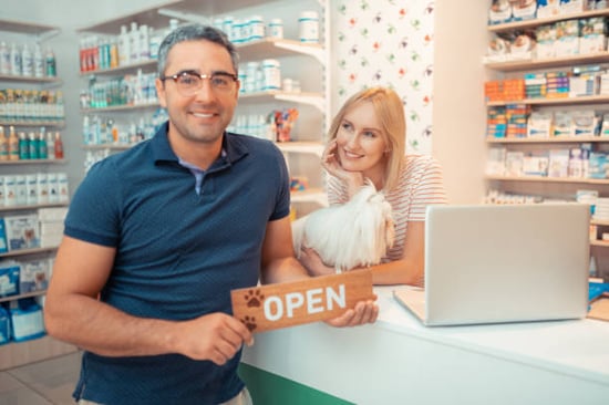 small pet business with open sign at front desk