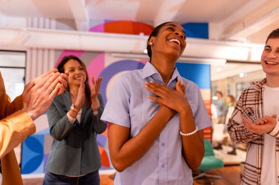 pet staff recognizing and applauding a hardworking employee