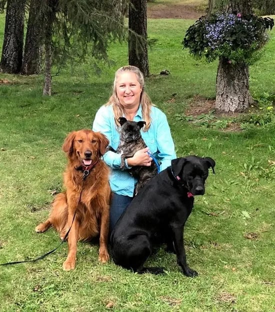 Amber Schick and dog clients at her pet-care business